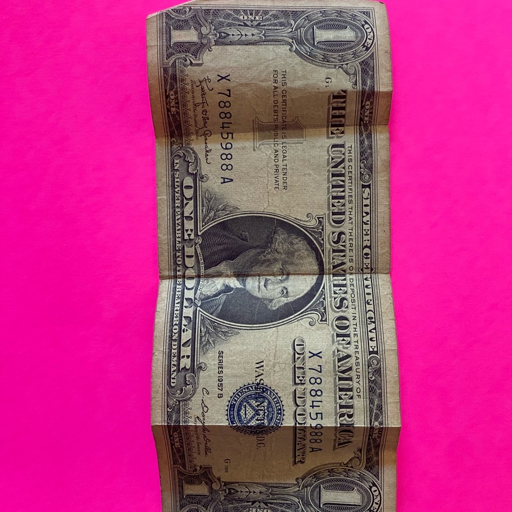 1957 B silver certificate dollar bill.  In good condition